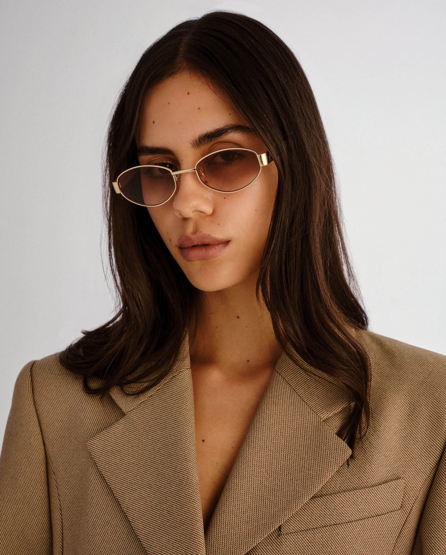 The Boston Tan Female Oval Sunglasses | Luv Lou