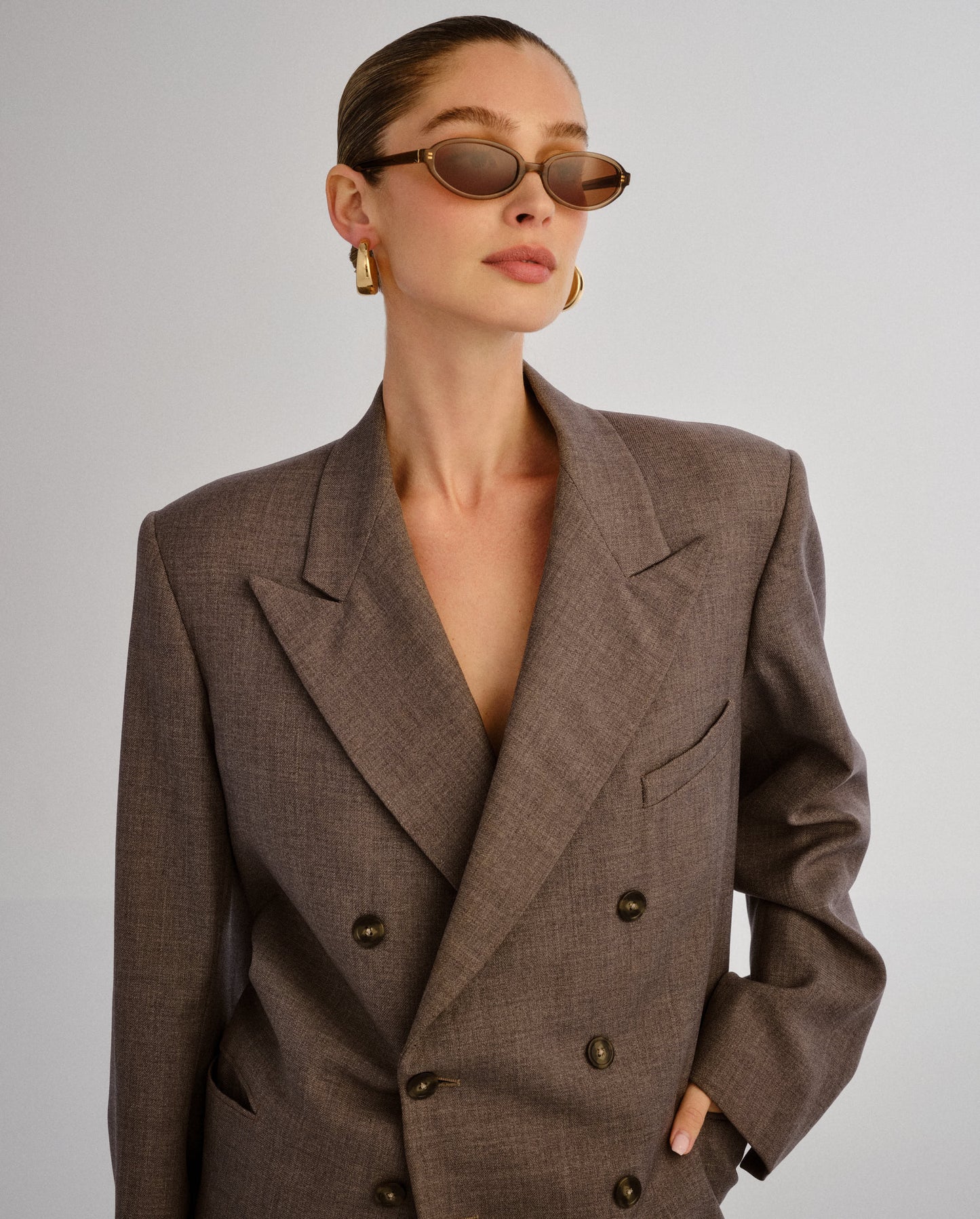 The Olive Chocolate Crystal Female Oval Sunglasses | Luv Lou