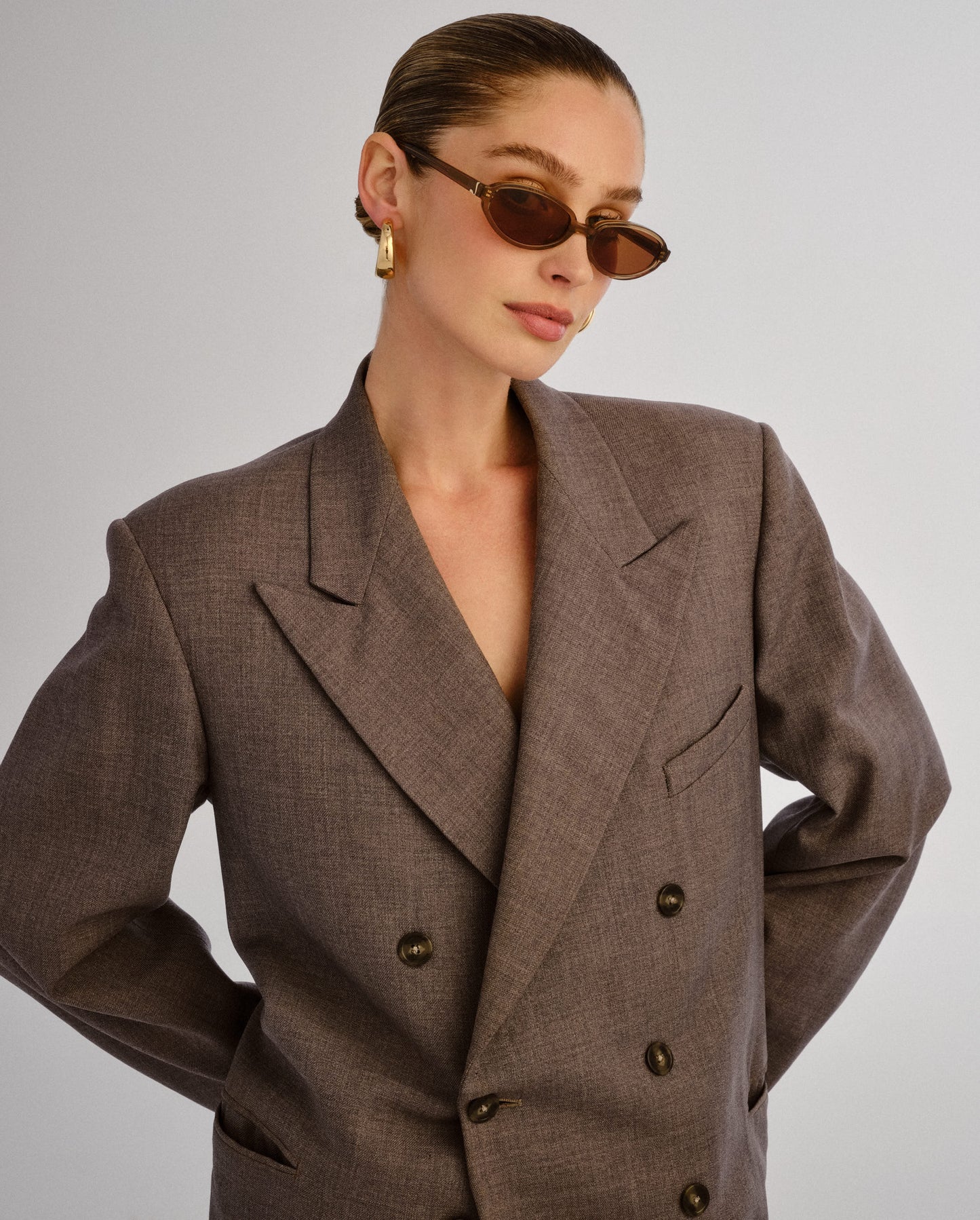 The Olive Chocolate Crystal Female Oval Sunglasses | Luv Lou