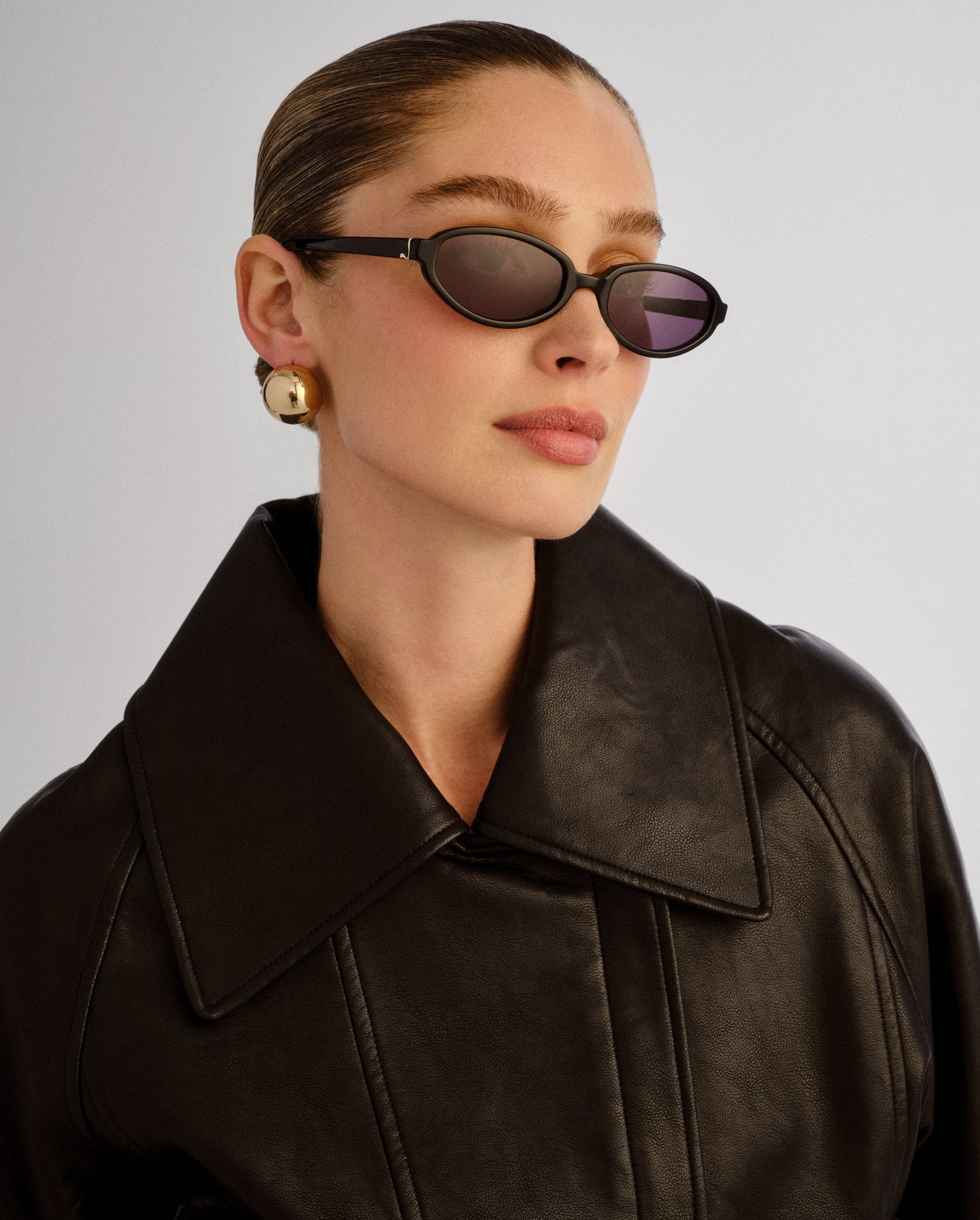 The Olive Black Female Oval Sunglasses | Luv Lou