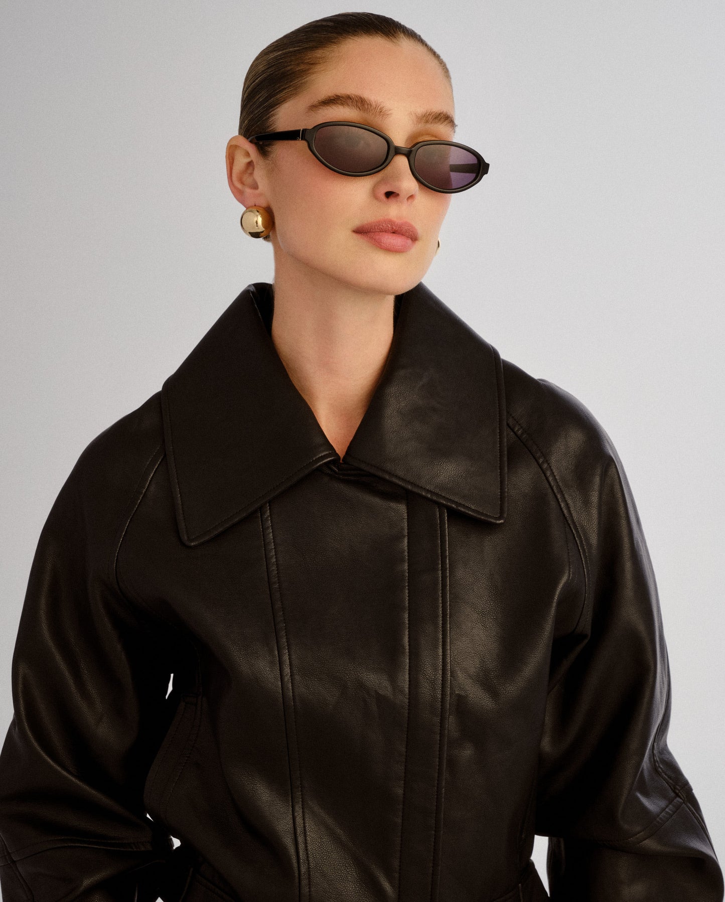 The Olive Black Female Oval Sunglasses | Luv Lou