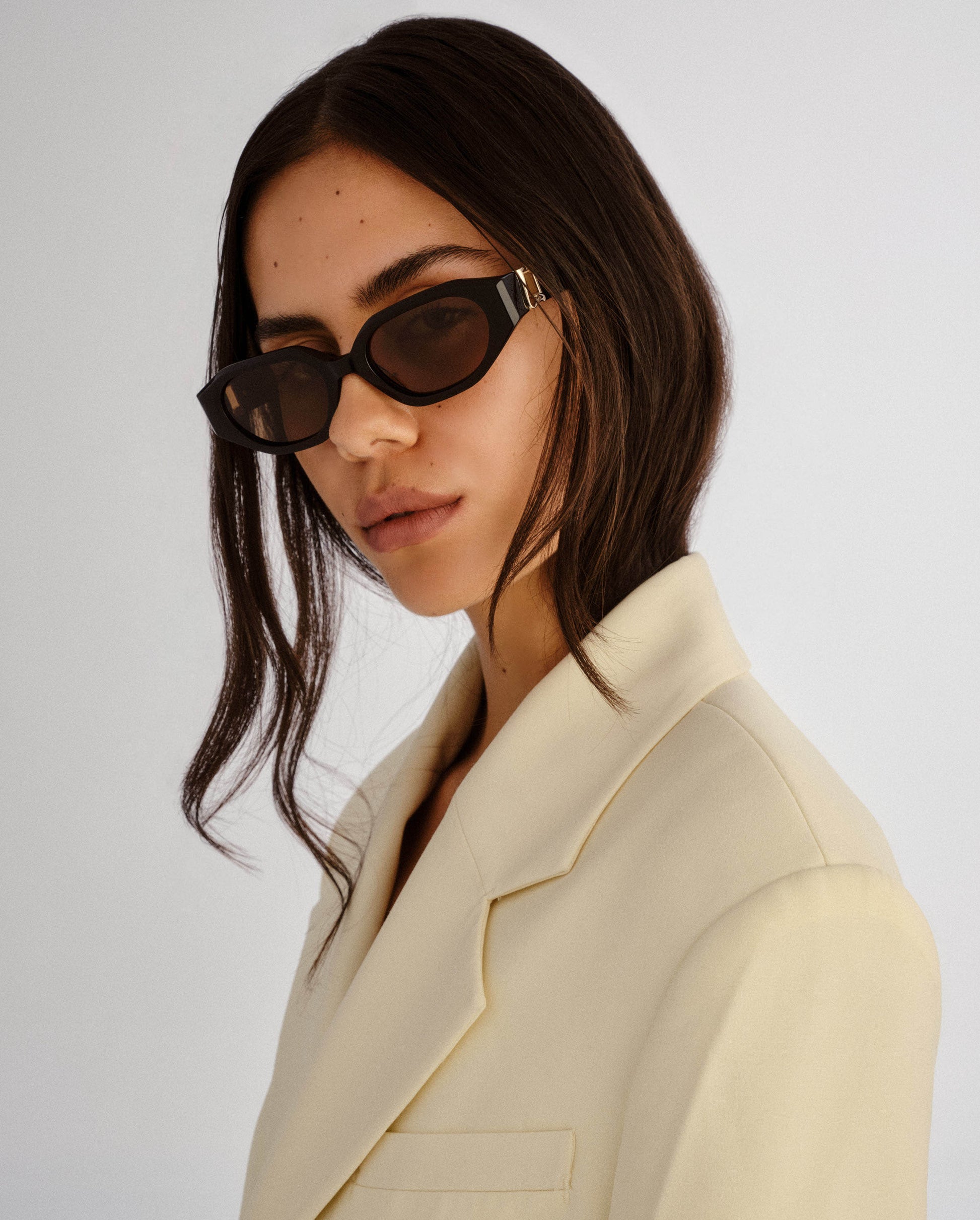 The Freddie Black Female Oval Sunglasses | Luv Lou