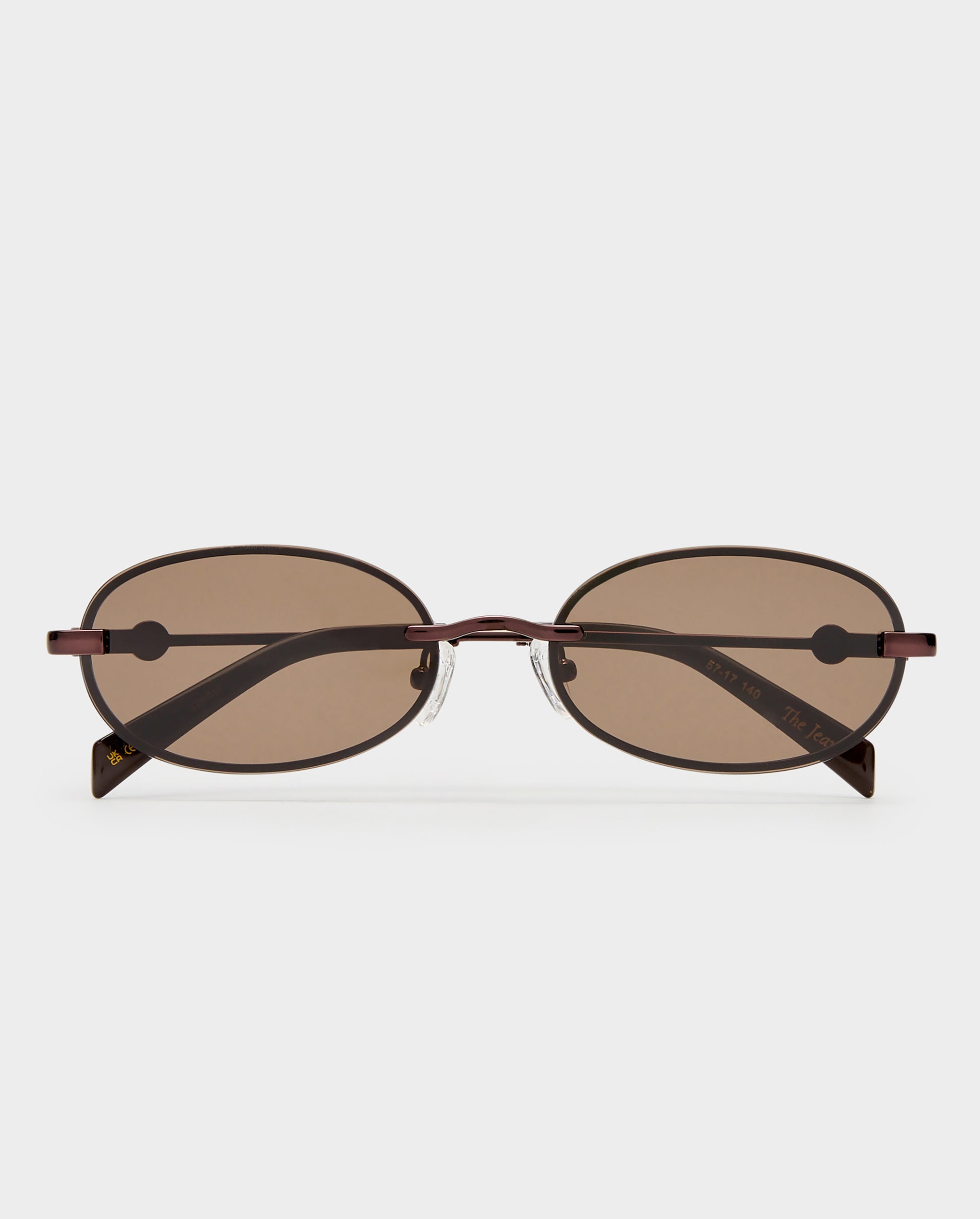 The Jean Bronze Female Oval Sunglasses | Luv Lou