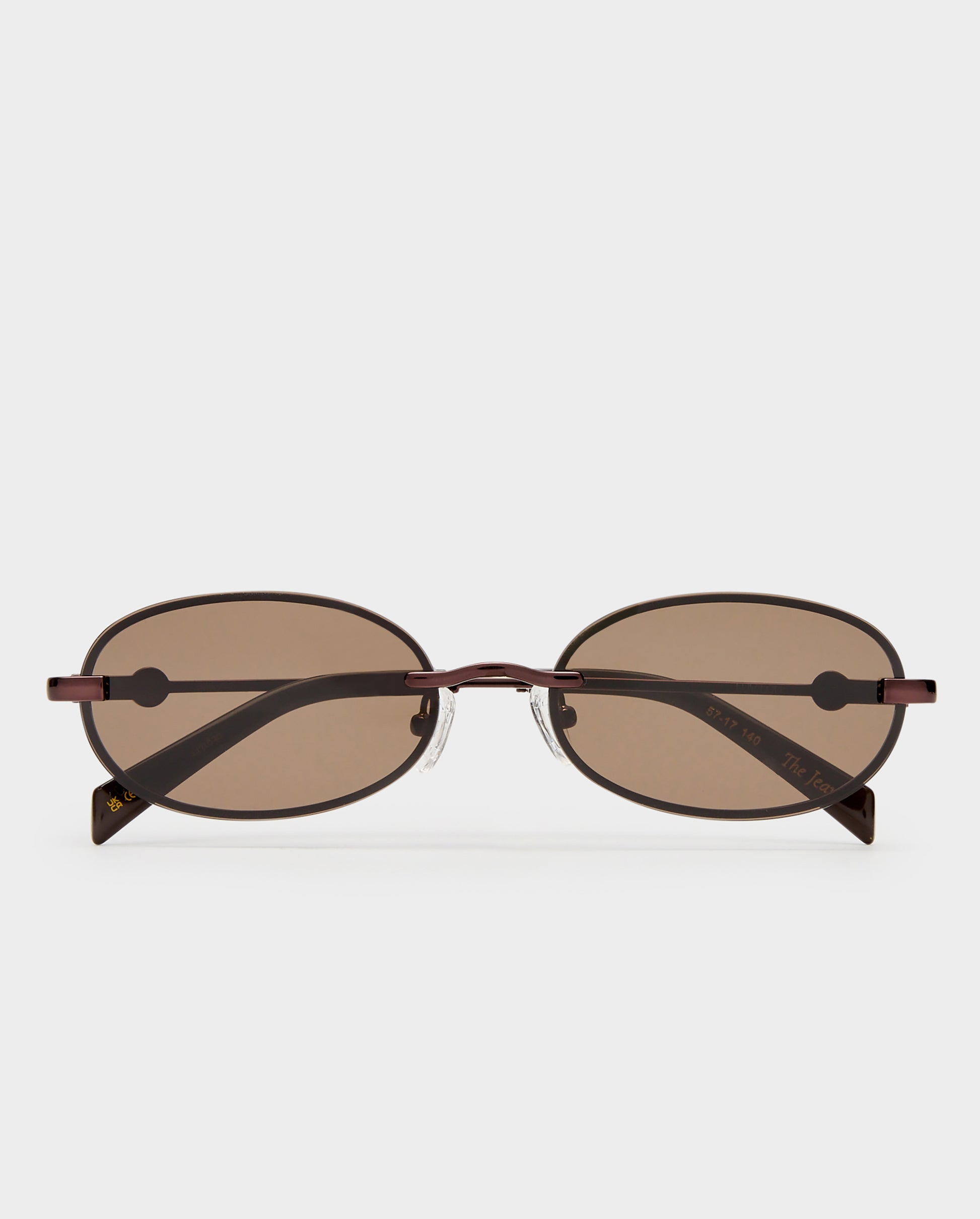 The Jean Bronze Female Oval Sunglasses | Luv Lou