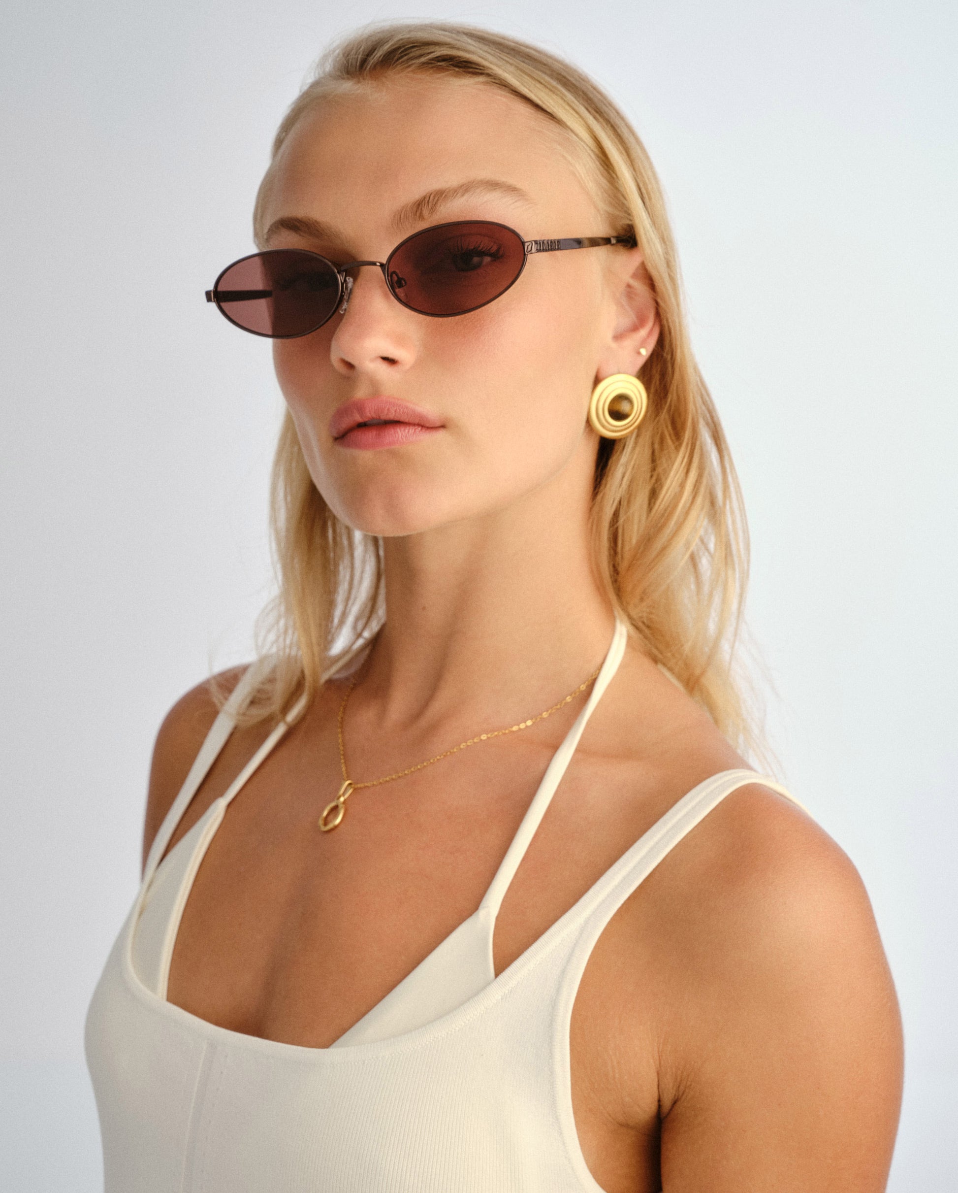 The Kendall Bronze Female Oval Sunglasses | Luv Lou