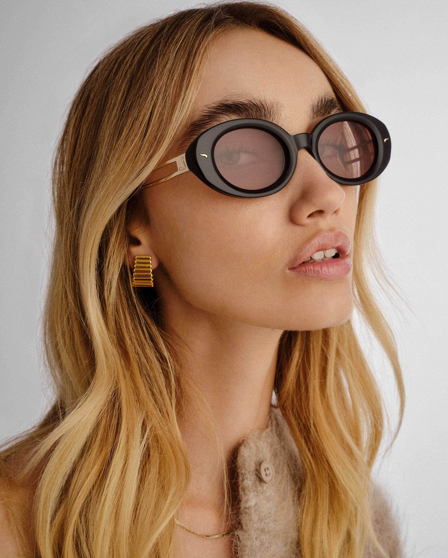 The Avalon Black Female Oval Sunglasses | Luv Lou