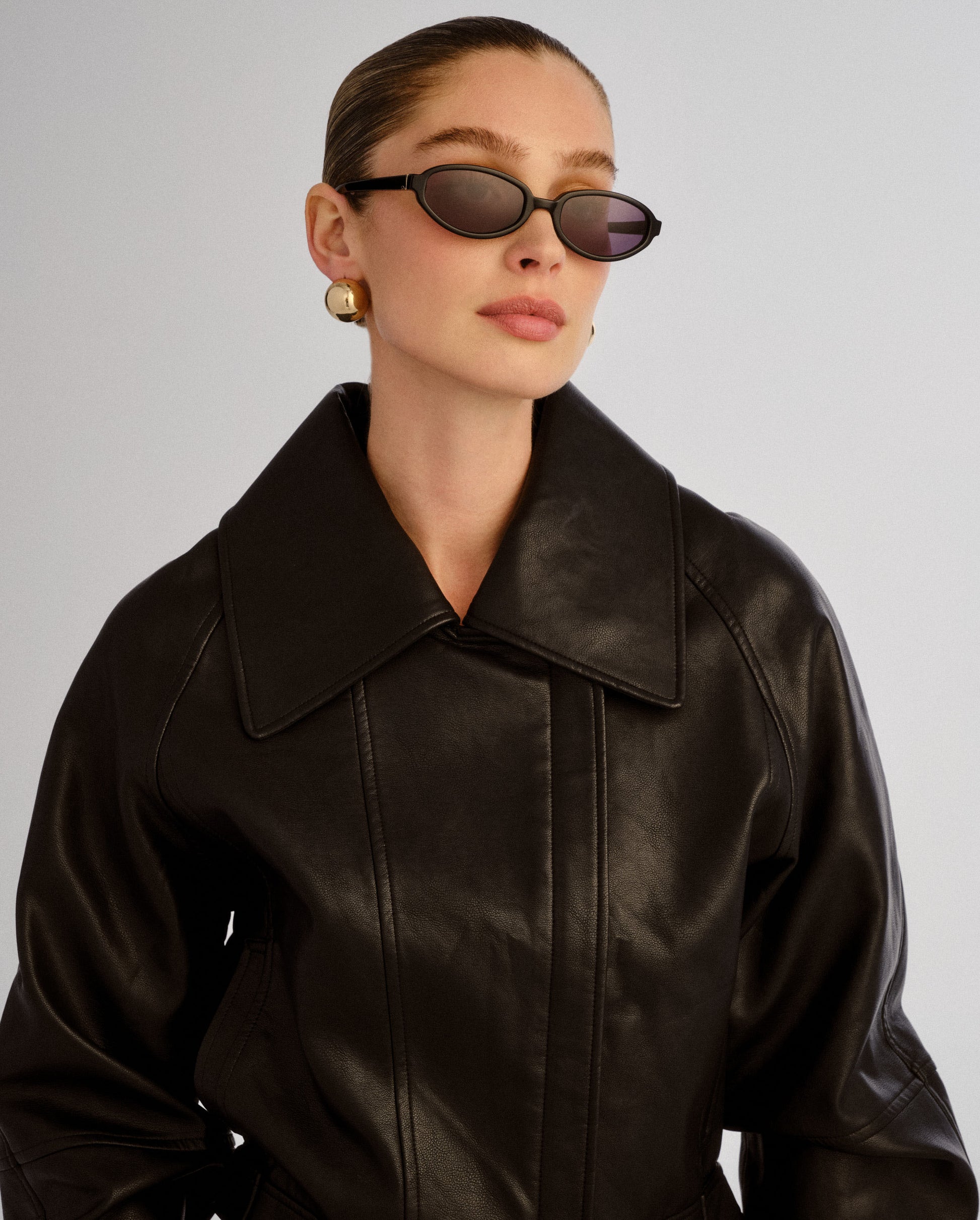 The Olive Black Female Oval Sunglasses | Luv Lou