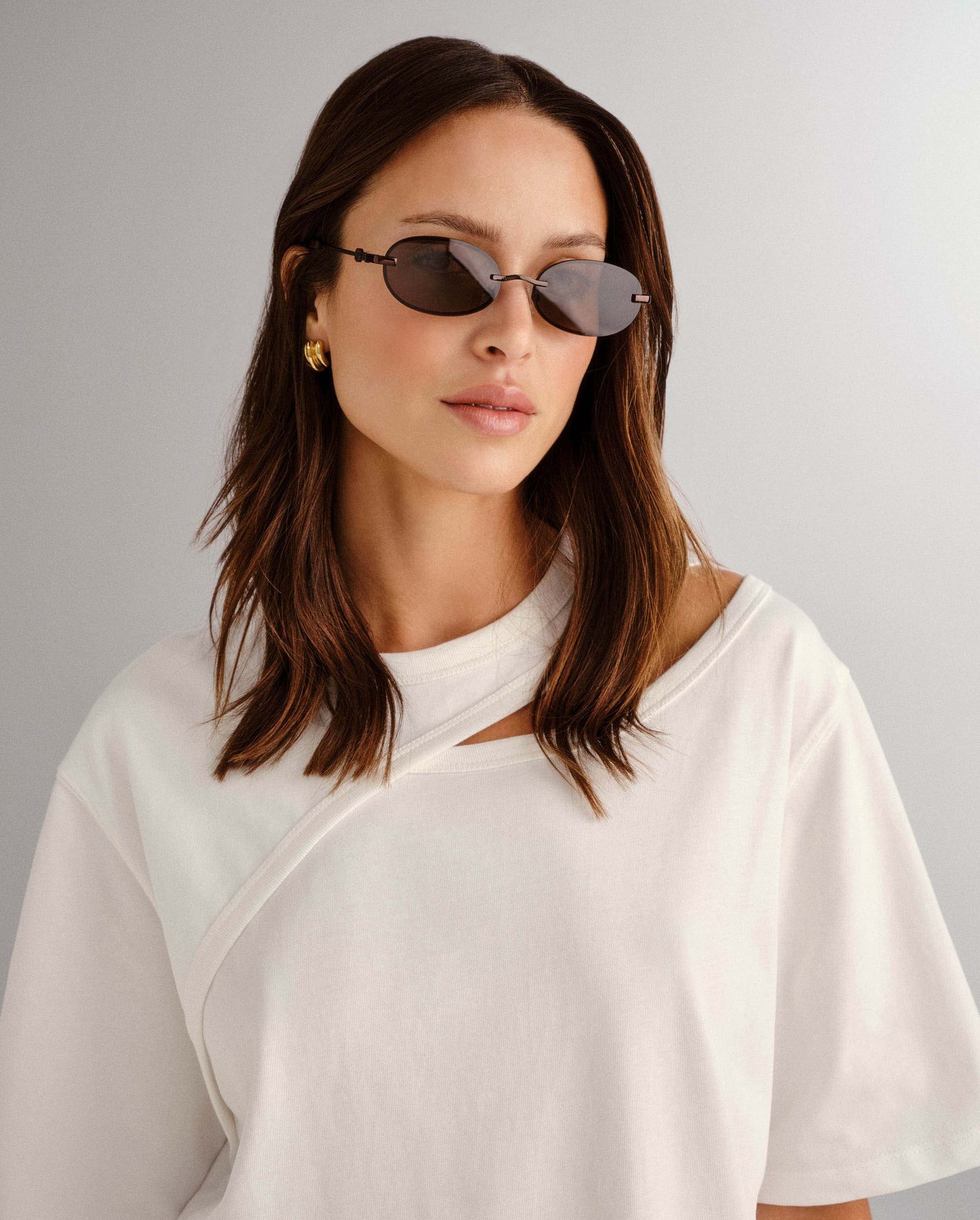 The Jean Bronze Female Oval Sunglasses | Luv Lou